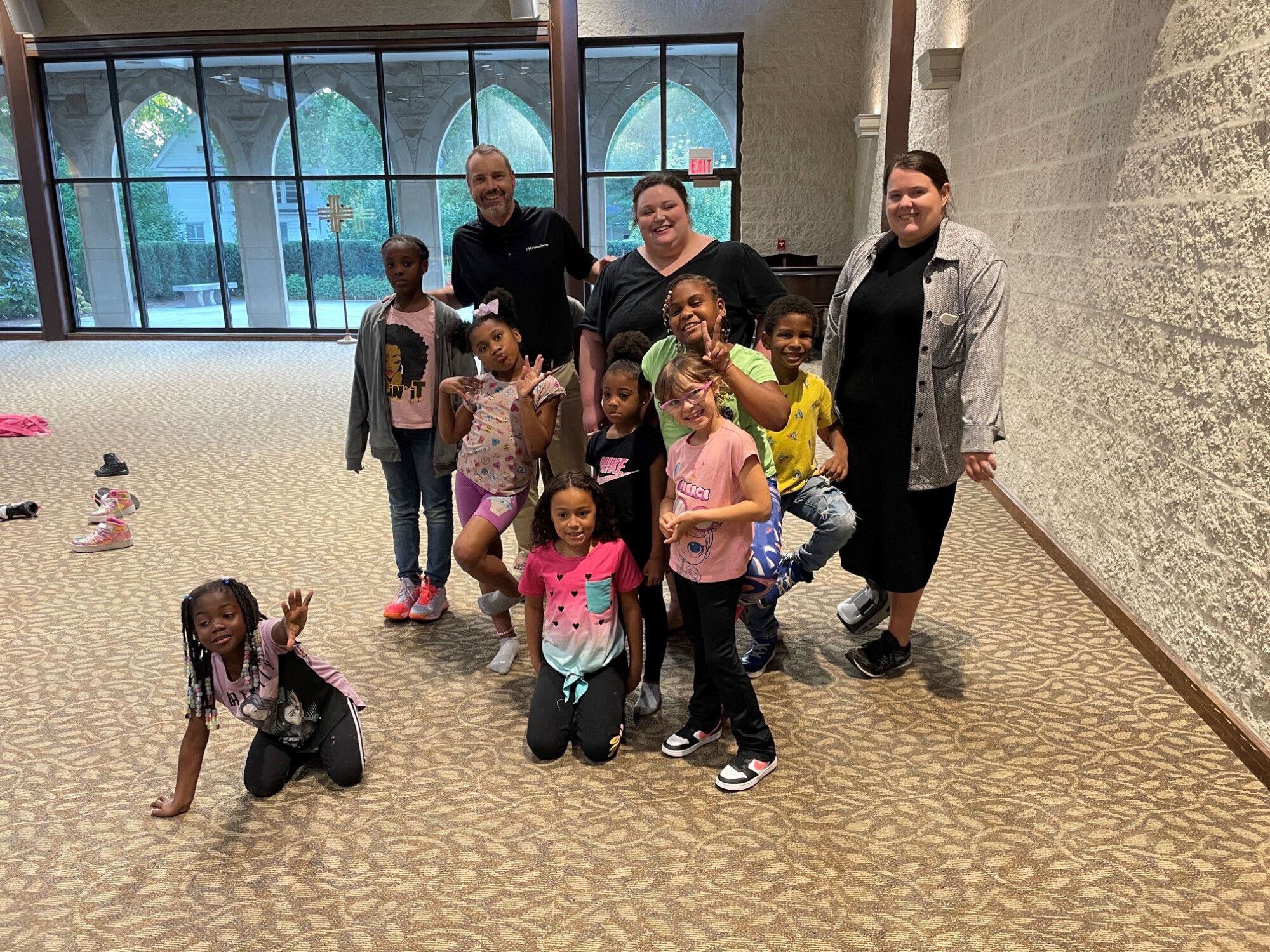 group of children and 3 adults